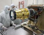 Lockheed Martin technicians prepare the GLM instrument