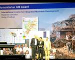 Basanta Shrestha (in the middle), ICIMOD's Director of Strategic Cooperation, receiving the Award in San Diego (Image: ICIMOD)