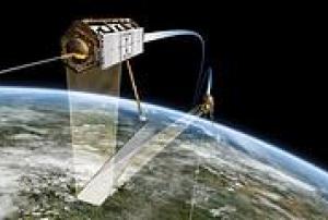 Illustration of TerraSAR-X orbiting Earth along with TanDEM-X